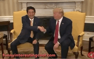 Trump Abe Handshake White House 1